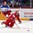 HELSINKI, FINLAND - DECEMBER 29: Alexander Patsenkin #16 of Belarus reaches for the loose puck while Russia's Alexander Dergachyov #25 looks on during preliminary round action at the 2016 IIHF World Junior Championship. (Photo by Andre Ringuette/HHOF-IIHF Images)

